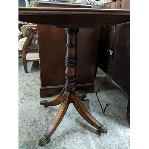 302 - Georgian mahogany pedestal snap top occasional table, brass caps and coasters, and a low side table ... 