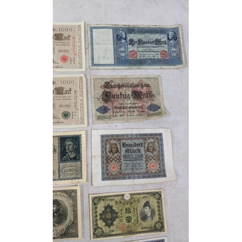 329 - Banknotes to include a French 1792 Revolution, Japanese Government and German examples Location:CAB1