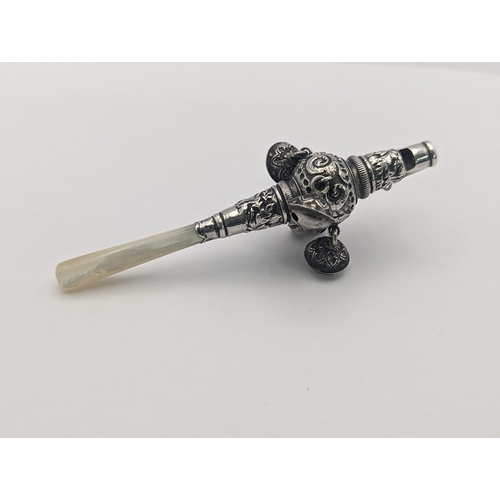 56 - A late 19th/early 20th century white metal baby rattle whistle having a Mother of Pearl handle
Locat... 