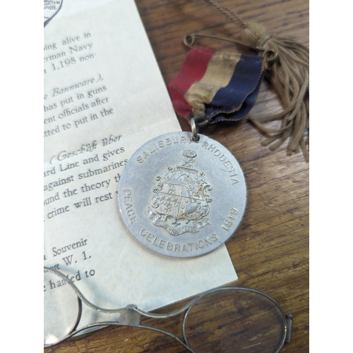 57 - A mixed lot to include silver plated food tray ladles and others along with a boxed Lusitania Medal,... 