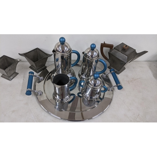 215 - An Art Deco style inox coffee set together with a pewter three piece tea set
Location:5.2