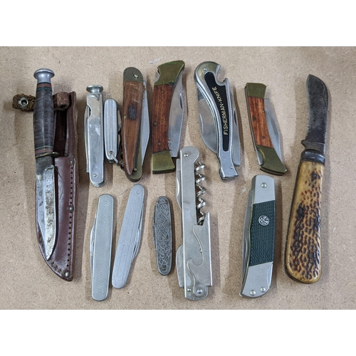 26 - An early 20th century William Rodgers fighting knife together with mixed pen knives including a Blyd... 