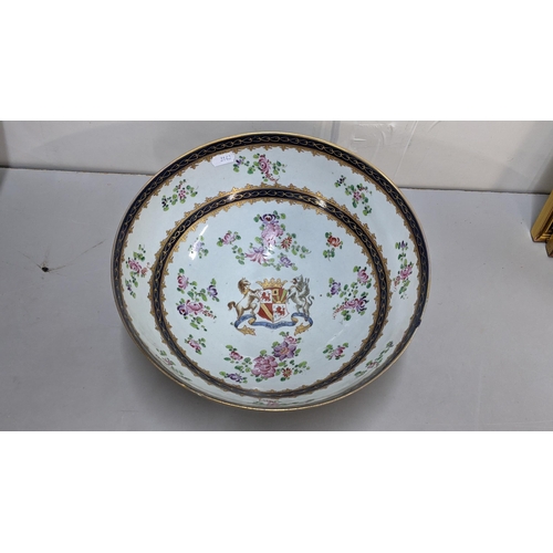 347 - A 19th century Samson punch bowl decorated in the Chinese armorial style, 12.5cm h x 30cm w
Location... 