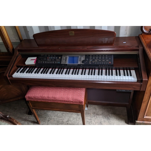 95 - A Yamaha Clavinova CVP-205 electric keyboard piano, 89.5cm h x 137cm w, together with a piano stool
... 