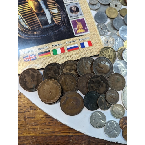 10 - Mixed coins from around the world to include British Victorian and later pennies, USA, Netherlands, ... 