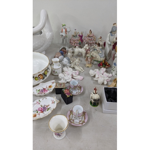 337 - A mixed lot to include Crown Derby posies trinket dishes, a Beswick poodle, mixed continental figuri... 