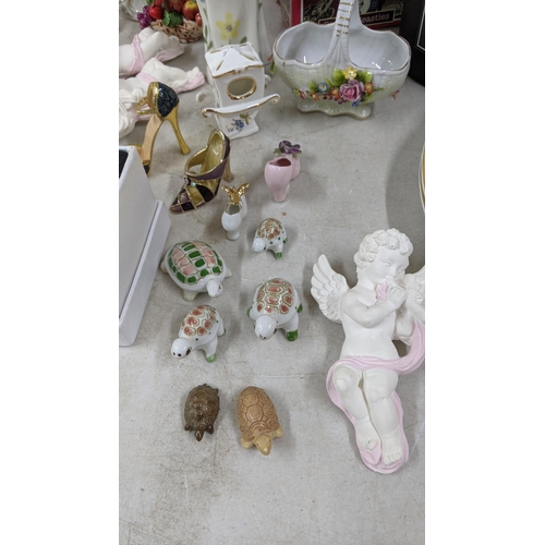 337 - A mixed lot to include Crown Derby posies trinket dishes, a Beswick poodle, mixed continental figuri... 