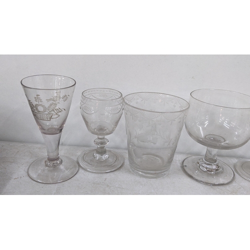 45 - A selection of Georgian and later glasses together with a pair of cutlery rests and two paperweights... 