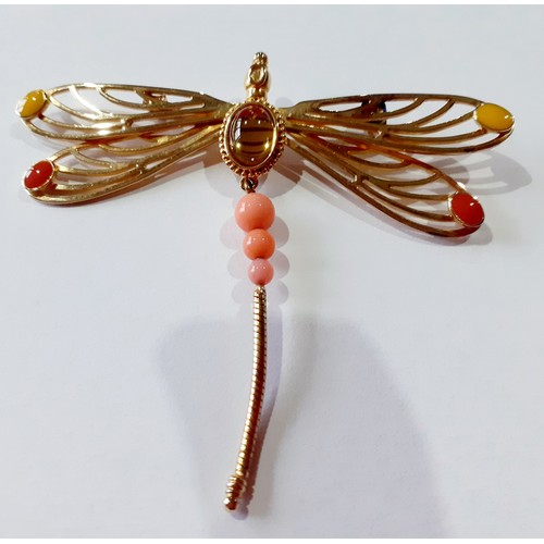 Lalique- A silver gilt dragonfly brooch having 2 red and 2 yellow coloured cabochons to the wings, a central citrine coloured cabochon to the body and 3 coral coloured cabochon beads to the tail, stamped with the makers name and 925 to the reverse, housed in a branded slip case and box. Location:Cab3