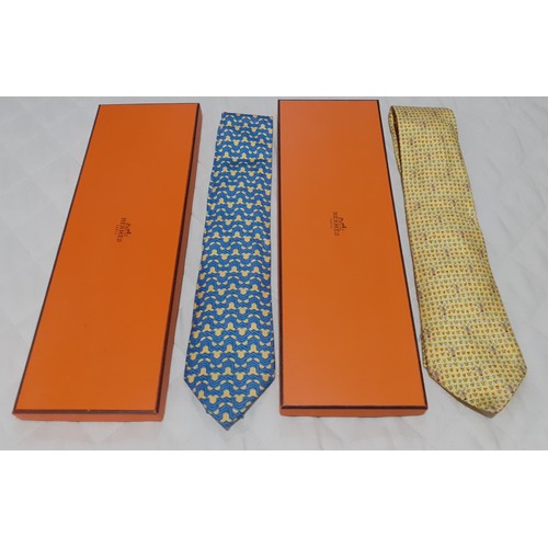 138 - Hermes-A yellow and blue silk tie with geometric pattern and branded iconic orange branded box toget... 