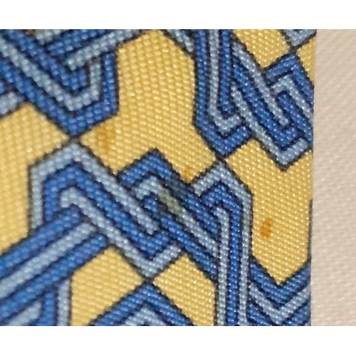 138 - Hermes-A yellow and blue silk tie with geometric pattern and branded iconic orange branded box toget... 