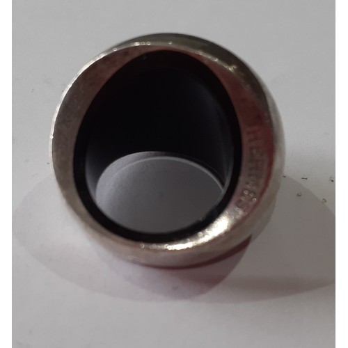 142 - Hermes-A Contemporary silver ring of bulbous form having a black composition lining, stamped with th... 