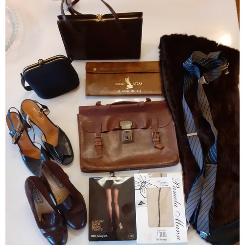 152 - A mid 20th Century brown weekend suitcase and contents to include a leather music satchel, 2 pairs o... 