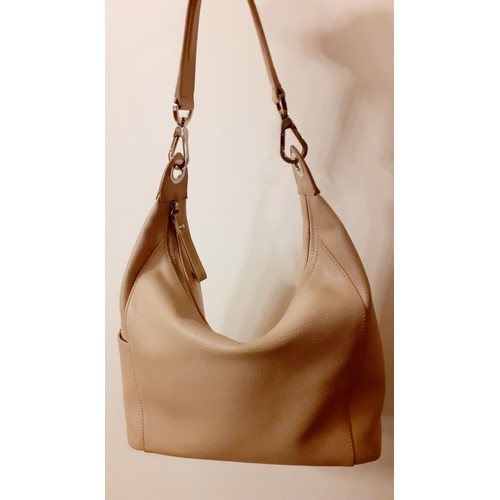 161 - Longchamp-A cream textured leather handbag, 30cm wide x 21cm high (middle) x 35cm high (sides) with ... 