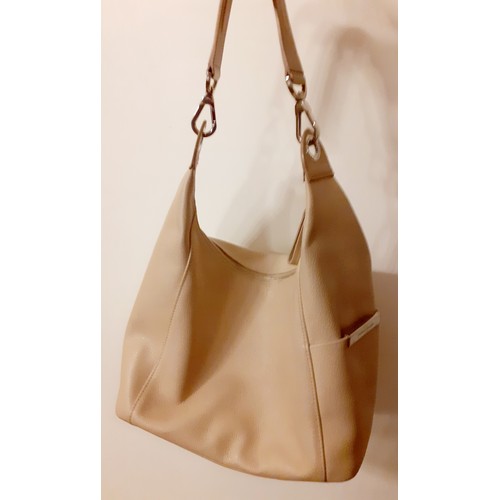 161 - Longchamp-A cream textured leather handbag, 30cm wide x 21cm high (middle) x 35cm high (sides) with ... 