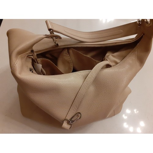 161 - Longchamp-A cream textured leather handbag, 30cm wide x 21cm high (middle) x 35cm high (sides) with ... 