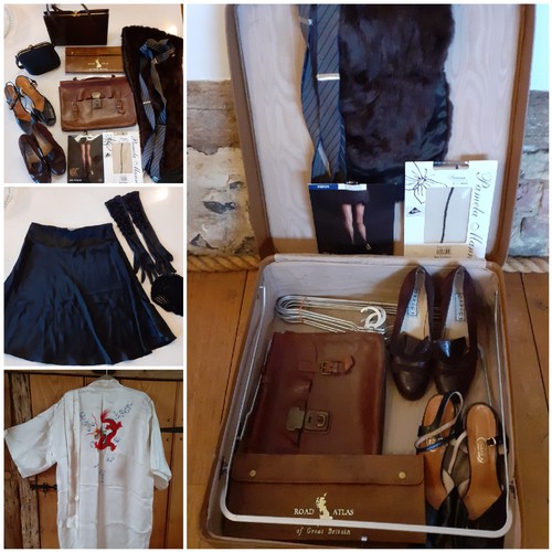 152 - A mid 20th Century brown weekend suitcase and contents to include a leather music satchel, 2 pairs o... 