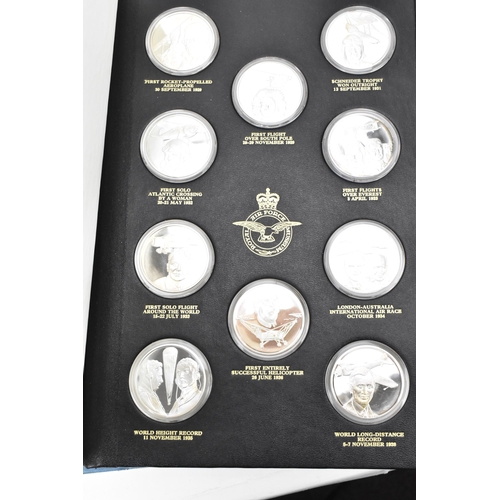 110 - History of man in Flight - A set of 50 silver medals by Pinches for the Royal Air Force Museum, hous... 