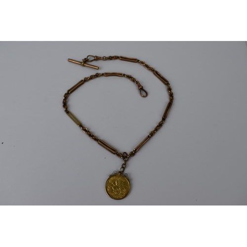 13 - A 9ct gold early 20th century watch chain having T bar and dog clip, along with a mounted 1909 half ... 