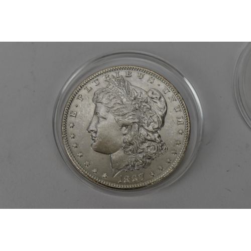 70 - United States of America - 'Morgan' silver Dollar, dated 1887, along with a 1922 'Peace' Dollar toge... 