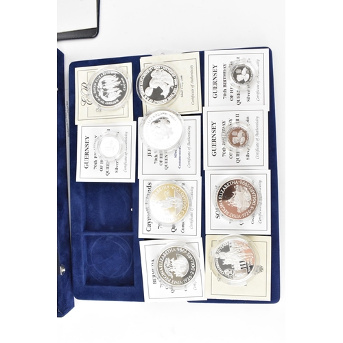 74 - A collection of 22 Elizabeth II silver proof coins, to include 70th Birthday examples, 1997 Chinese ... 