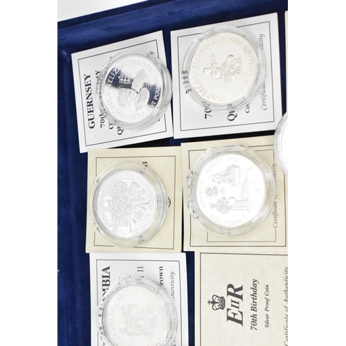 74 - A collection of 22 Elizabeth II silver proof coins, to include 70th Birthday examples, 1997 Chinese ... 