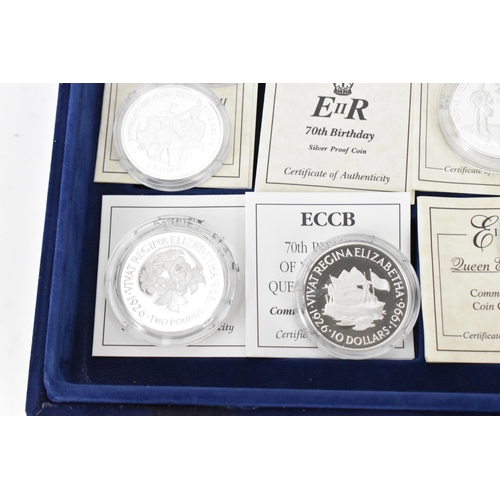 74 - A collection of 22 Elizabeth II silver proof coins, to include 70th Birthday examples, 1997 Chinese ... 