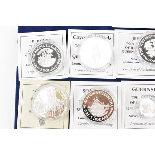 74 - A collection of 22 Elizabeth II silver proof coins, to include 70th Birthday examples, 1997 Chinese ... 