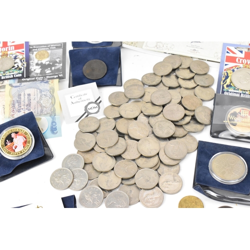 85 - A mixed lot of British and world coins to include a 24ct gold 1/25 oz 1997 golden wedding £5 coin, 1... 