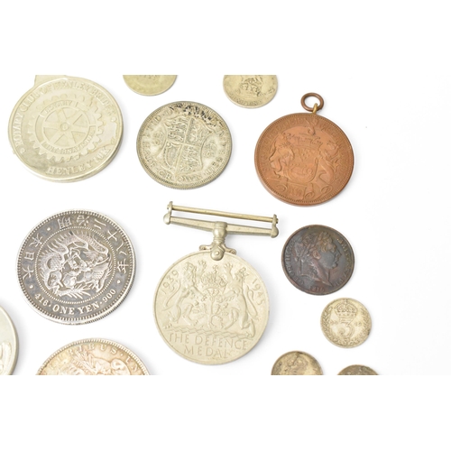 93 - A mixed collection of Victorian Silver and other coinage to include an 1882 'Morgan' Dollar, One Yen... 