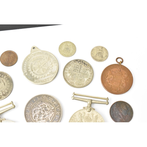 93 - A mixed collection of Victorian Silver and other coinage to include an 1882 'Morgan' Dollar, One Yen... 