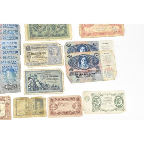 97 - A mixed collection of early 20th century and later world banknotes, to include Germany 1914, Notgeld... 