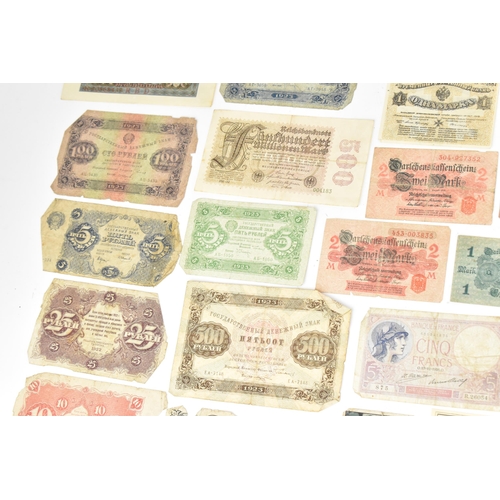 97 - A mixed collection of early 20th century and later world banknotes, to include Germany 1914, Notgeld... 