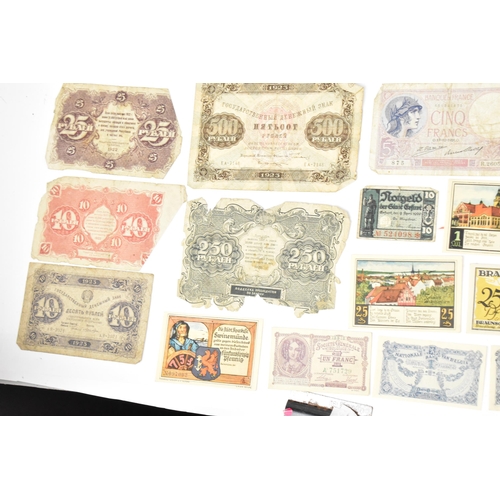 97 - A mixed collection of early 20th century and later world banknotes, to include Germany 1914, Notgeld... 