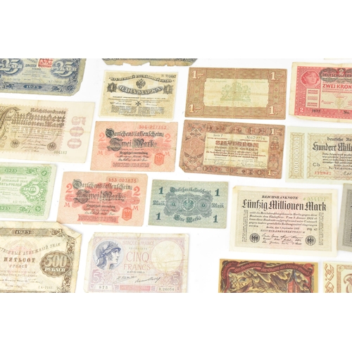 97 - A mixed collection of early 20th century and later world banknotes, to include Germany 1914, Notgeld... 