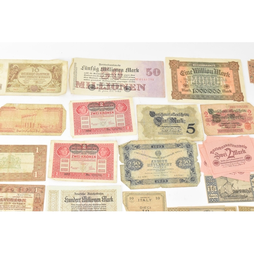 97 - A mixed collection of early 20th century and later world banknotes, to include Germany 1914, Notgeld... 