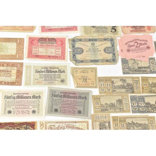 97 - A mixed collection of early 20th century and later world banknotes, to include Germany 1914, Notgeld... 