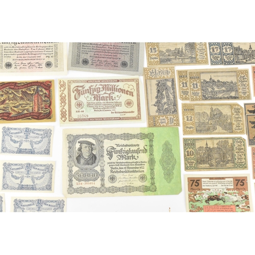 97 - A mixed collection of early 20th century and later world banknotes, to include Germany 1914, Notgeld... 