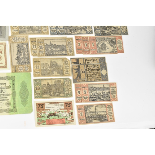 97 - A mixed collection of early 20th century and later world banknotes, to include Germany 1914, Notgeld... 