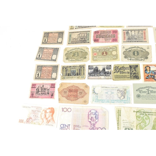 97 - A mixed collection of early 20th century and later world banknotes, to include Germany 1914, Notgeld... 