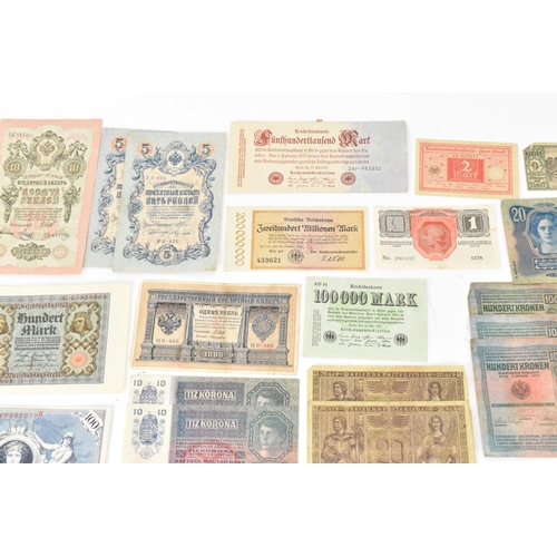 97 - A mixed collection of early 20th century and later world banknotes, to include Germany 1914, Notgeld... 