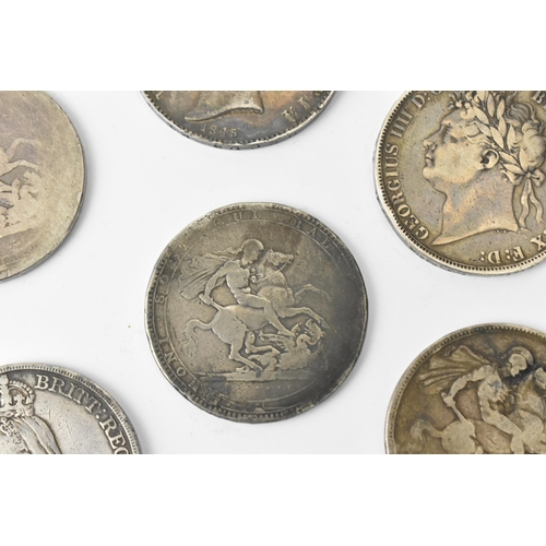 99 - United Kingdom - Silver crowns to include George III 1819 and one other with worn date, George IV 18... 