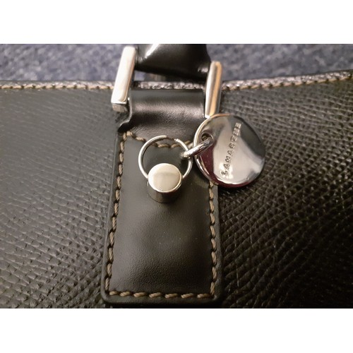 8 - Longchamp-A tan calfskin leather 'baguette' shoulder bag with fabric zipped closure, silver tone har... 