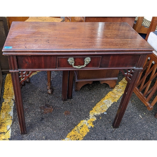 329 - A Georgian mahogany fold over tea table having a single drawer and chamfered legs, 73.5cm h x 83cm w... 