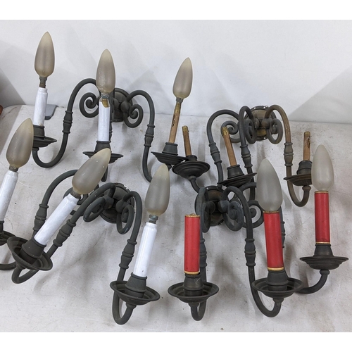 335 - A set of four patinated brass wall hanging three branch wall lights
Location: LAM