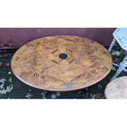 338 - A Victorian and later walnut oval topped table together with a painted octagonal topped table and an... 