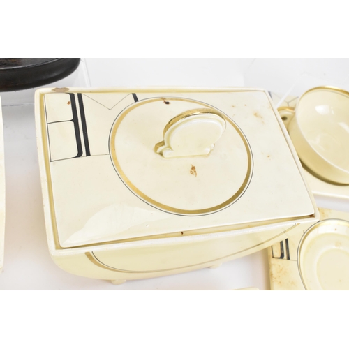 406 - An Art Deco Clarice Cliff ''Biarritz'' dinner service, comprising two platters, six dinner plates, s... 