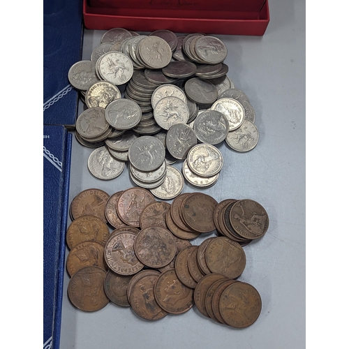 427 - A mixed collection of British coinage Victorian and later, half penny 1866, George V and VI sixpence... 