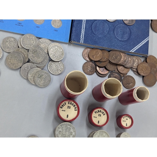 427 - A mixed collection of British coinage Victorian and later, half penny 1866, George V and VI sixpence... 