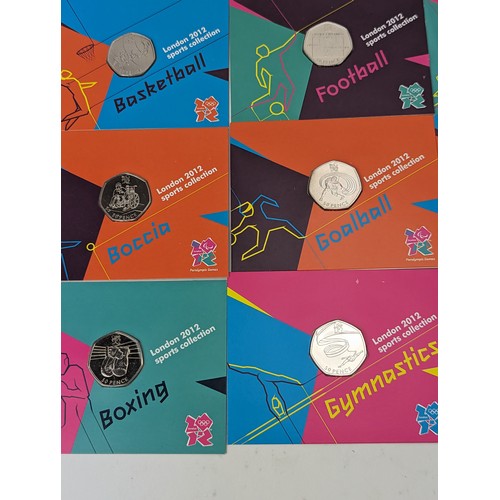 107 - London 2012 Olympic Games - a full collection of 29 50pence coins in Royal Mint presentation cards a... 